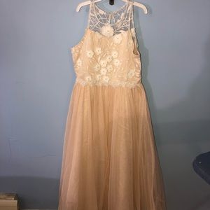 Cream colored lace looking top young girls dress.